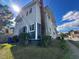 Side view of two-story home, showcasing a unique architectural style at 1601 Fayetteville St, Durham, NC 27707