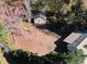 Aerial view showing detached garage and additional outbuildings at 318 Rawls Church Rd, Angier, NC 27501