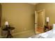 Simple bedroom with neutral decor and hardwood floors at 318 Rawls Church Rd, Angier, NC 27501