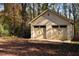 Charming two-car detached garage with X-design doors at 318 Rawls Church Rd, Angier, NC 27501