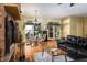 Dining area with a table for six and view of the living room at 318 Rawls Church Rd, Angier, NC 27501