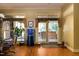 Bright dining room with hardwood floors and access to a patio at 318 Rawls Church Rd, Angier, NC 27501