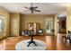 Spacious entryway with hardwood floors, round table, and seating area at 318 Rawls Church Rd, Angier, NC 27501