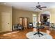 Bright entryway with hardwood floors, round table, and seating area at 318 Rawls Church Rd, Angier, NC 27501