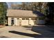 Detached three-car garage with extra storage at 318 Rawls Church Rd, Angier, NC 27501
