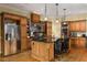 Spacious kitchen featuring an island, stainless steel appliances, and ample cabinetry at 318 Rawls Church Rd, Angier, NC 27501