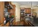 Kitchen with stainless steel appliances and granite countertops at 318 Rawls Church Rd, Angier, NC 27501