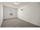 Bright bedroom with neutral wall and carpet at 357 E Porthaven Way, Clayton, NC 27527