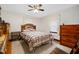 Bedroom with a double bed, dresser, and ceiling fan at 511 Elmira Ave, Durham, NC 27707