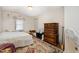 Bedroom with a double bed, dresser, and window at 511 Elmira Ave, Durham, NC 27707