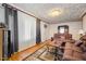 Living room with hardwood floors and ample natural light at 511 Elmira Ave, Durham, NC 27707