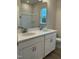 Bathroom with double vanity, quartz countertop and large mirror at 611 Hyperion Aly, Wake Forest, NC 27587