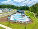 Aerial view of resort-style pool with surrounding lounge area at 744 Georgia'S Landing Pkwy # 5, Raleigh, NC 27603
