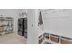 Laundry room with washer, dryer, storage shelves, and bench at 15 Abundance Ln, Pittsboro, NC 27312