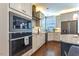 Modern kitchen with stainless steel appliances and granite countertops at 1519 St Andrews Dr, Mebane, NC 27302