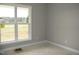 Simple bedroom with a window and neutral wall color at 1590 Nc 96 Hwy S, Franklinton, NC 27525