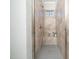 Walk-in shower with beige tiles and built-in seat at 1617 Pasture Hills Dr, Wake Forest, NC 27587