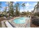 Inviting pool with patio furniture, offering a relaxing outdoor space at 200 Holbrook Hill Ln, Holly Springs, NC 27540