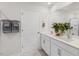 Bathroom with double vanity, large mirror, and plenty of storage at 2010 Fletchers Ridge Dr, Durham, NC 27703