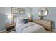 Bedroom with light blue walls and a queen-size bed at 2010 Fletchers Ridge Dr, Durham, NC 27703