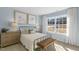 Bedroom with metal bed frame and view of backyard at 2010 Fletchers Ridge Dr, Durham, NC 27703