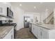 Modern kitchen with granite countertops and stainless steel appliances at 2010 Fletchers Ridge Dr, Durham, NC 27703