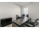 Home office with a large desk, two monitors, and ample workspace at 2010 Fletchers Ridge Dr, Durham, NC 27703