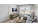Bright recreation room with large window and comfortable seating at 2010 Fletchers Ridge Dr, Durham, NC 27703