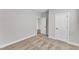 Cozy bedroom with neutral carpet, white trim, and a closet at 206 Brickwell Way, Youngsville, NC 27596