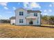 Two-story home with covered patio and grassy yard at 22 Laramie Ln, Selma, NC 27576