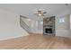 Spacious living room with stone fireplace and hardwood floors at 22 Laramie Ln, Selma, NC 27576