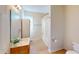 Clean bathroom with shower/tub combo and wood floor at 308 E First St, Princeton, NC 27569