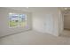 Spacious bedroom with window and closet at 409 Blue Aspen Dr, Fuquay Varina, NC 27526