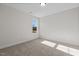 Well-lit bedroom with window and carpet at 41 Red River Dr, Selma, NC 27576