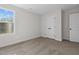 Bright bedroom with double door closet and window at 41 Red River Dr, Selma, NC 27576