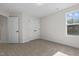 Spacious bedroom with double door closet and window at 41 Red River Dr, Selma, NC 27576