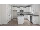 Modern kitchen with white cabinets and granite countertops at 41 Red River Dr, Selma, NC 27576