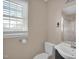Clean bathroom with a single sink vanity and shower/tub combo at 502 Lemontree Ct, Graham, NC 27253
