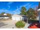 Two-car garage with backyard access and garden at 502 Lemontree Ct, Graham, NC 27253