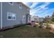 Rear view of house showing exterior and garden at 502 Lemontree Ct, Graham, NC 27253