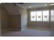 Bright bedroom with large window and neutral wall paint at 55 Basil Ct, Franklinton, NC 27525