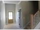 Spacious entryway with stairs and neutral color scheme at 55 Basil Ct, Franklinton, NC 27525