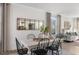 Farmhouse style dining room with white table and black chairs at 712 Apple Churn Dr, Fuquay Varina, NC 27526