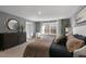 Main bedroom with king-size bed and ensuite bathroom access at 712 Apple Churn Dr, Fuquay Varina, NC 27526