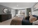 Main bedroom with king-size bed and large window at 716 Apple Churn Dr, Fuquay Varina, NC 27526