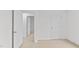 Bedroom with two doors and carpet flooring at 7549 Michelle Rd, Rocky Mount, NC 27803