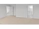 Spacious bedroom with carpet and access to bathroom at 7549 Michelle Rd, Rocky Mount, NC 27803