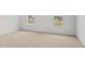 Bright bedroom with two windows and wall-to-wall carpet at 7549 Michelle Rd, Rocky Mount, NC 27803