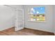 Bright home office with wood flooring, a door, and a large window at 7549 Michelle Rd, Rocky Mount, NC 27803