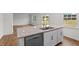 Kitchen island with granite countertop and dishwasher at 7549 Michelle Rd, Rocky Mount, NC 27803